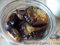 Фото приготовления рецепта: Жареные баклажаны в томате - шаг №7