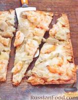 Фото к рецепту: Пицца из лаваша с креветками и артишоками
