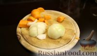 Фото приготовления рецепта: Куриные сердечки с овощами, запечённые в рукаве - шаг №11