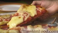 Фото к рецепту: Домашняя пицца на тонком бездрожжевом тесте