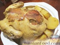Фото к рецепту: Курица с картофелем (в мультиварке)