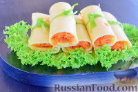 Фото к рецепту: Сырные рулетики с морковью