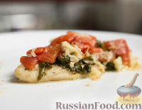 Фото к рецепту: Тилапия с помидорами и базиликом (в духовке)