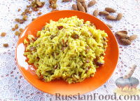 Фото к рецепту: Пряный рис с изюмом и миндалем