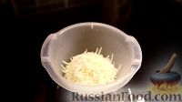 Фото приготовления рецепта: Фаршированные конкильони (макароны-ракушки) с курицей и сыром - шаг №9