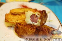 Фото к рецепту: Сосиски в картофельном пюре