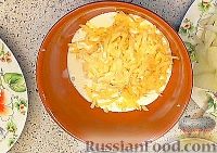 Фото приготовления рецепта: Запечённая гречка с кабачком, луком и сыром - шаг №4
