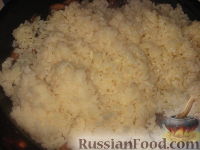 Фото приготовления рецепта: Рис с грибами - шаг №9