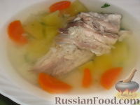 Фото приготовления рецепта: Рыбный суп с рисом - шаг №6