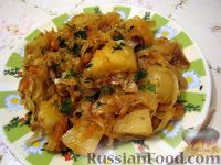 Фото к рецепту: Тушеная  кислая капуста с картофелем
