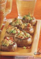 Фото к рецепту: Шампиньоны, фаршированные моллюсками