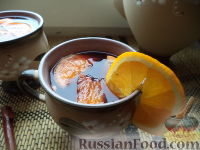 Фото к рецепту: Апельсиновый глинтвейн с корицей