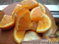 Фото приготовления рецепта: Апельсиновый глинтвейн с корицей - шаг №3