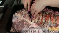 Фото приготовления рецепта: Фаршированная свинина, запеченная в духовке - шаг №7