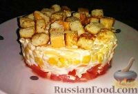 Фото к рецепту: Салат "Коррида" с крабовыми палочками, помидорами  и сухариками