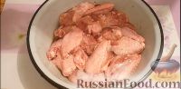 Фото приготовления рецепта: Куриные крылышки в духовке - шаг №2