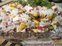Фото к рецепту: Салат с кальмарами и крабовыми палочками