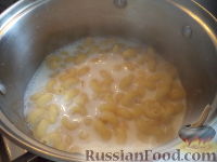 Фото приготовления рецепта: Суп молочный с макаронными изделиями - шаг №9