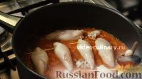 Фото приготовления рецепта: Фаршированные кальмары в томатном соусе - шаг №12