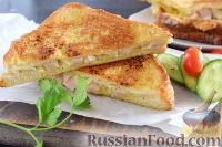 Фото к рецепту: Жареный сэндвич с ветчиной и сыром