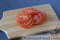 Фото приготовления рецепта: Куриное филе, запеченное с помидорами и сыром - шаг №9