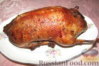 Фото к рецепту: Фаршированная утка в медово-соевом маринаде, в рукаве