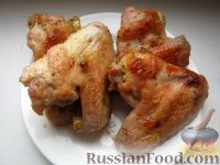 Фото к рецепту: Куриные крылышки в медовом соусе