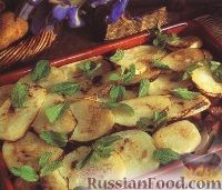 Фото к рецепту: Картофель, запеченный с бараниной в духовке