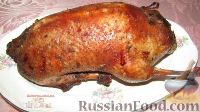 Фото приготовления рецепта: Фаршированная утка в медово-соевом маринаде, в рукаве - шаг №13