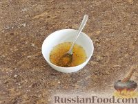 Фото приготовления рецепта: Рыбный рулет, запечённый с морковью, яйцом, сыром и маслинами (в фольге) - шаг №16