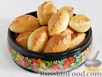 Фото приготовления рецепта: Пирожки из "хрущевского" теста, с капустой и яйцами - шаг №21