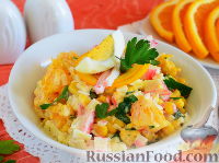 Фото к рецепту: Салат с крабовыми палочками и апельсином