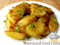 Фото к рецепту: Румяная картошечка в соевом соусе, запечённая в духовке