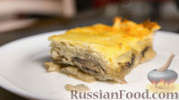 Фото к рецепту: Картошка с грибами, запеченная под сыром