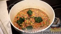 Фото приготовления рецепта: Рисовая каша с мясом и овощами - шаг №14