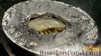 Фото приготовления рецепта: Скумбрия в духовке, запечённая в фольге - шаг №9