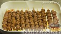 Фото приготовления рецепта: Шашлык из куриных сердечек на гриле - шаг №7