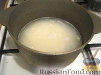 Фото приготовления рецепта: Каша молочная рисовая - шаг №2