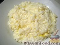 Фото приготовления рецепта: Каша молочная рисовая - шаг №5