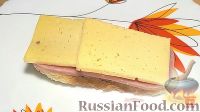 Фото приготовления рецепта: Бутерброды с ветчиной и сыром, на сковороде - шаг №5