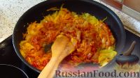 Фото приготовления рецепта: Рыба в томатном соусе - шаг №9