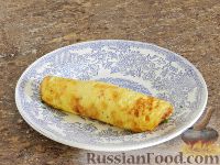 Фото приготовления рецепта: Сырный омлет с ветчиной - шаг №10