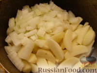 Фото приготовления рецепта: Свинина, запеченная с картофелем - шаг №6
