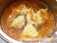 Фото приготовления рецепта: Куриный суп с галушками - шаг №7