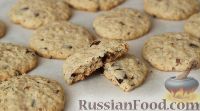 Фото к рецепту: Овсяное печенье с шоколадом и орехами