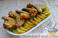 Фото приготовления рецепта: Куриные крылышки, запеченные с картофелем - шаг №8