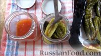 Фото приготовления рецепта: Острый перец в томатном соусе (на зиму) - шаг №9