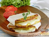 Фото к рецепту: Сэндвичи из кабачка с сыром
