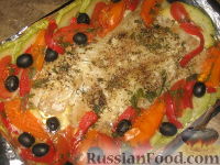 Фото к рецепту: Рыба, запеченная с овощами
