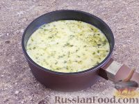 Фото приготовления рецепта: Сырный суп в хлебе - шаг №12